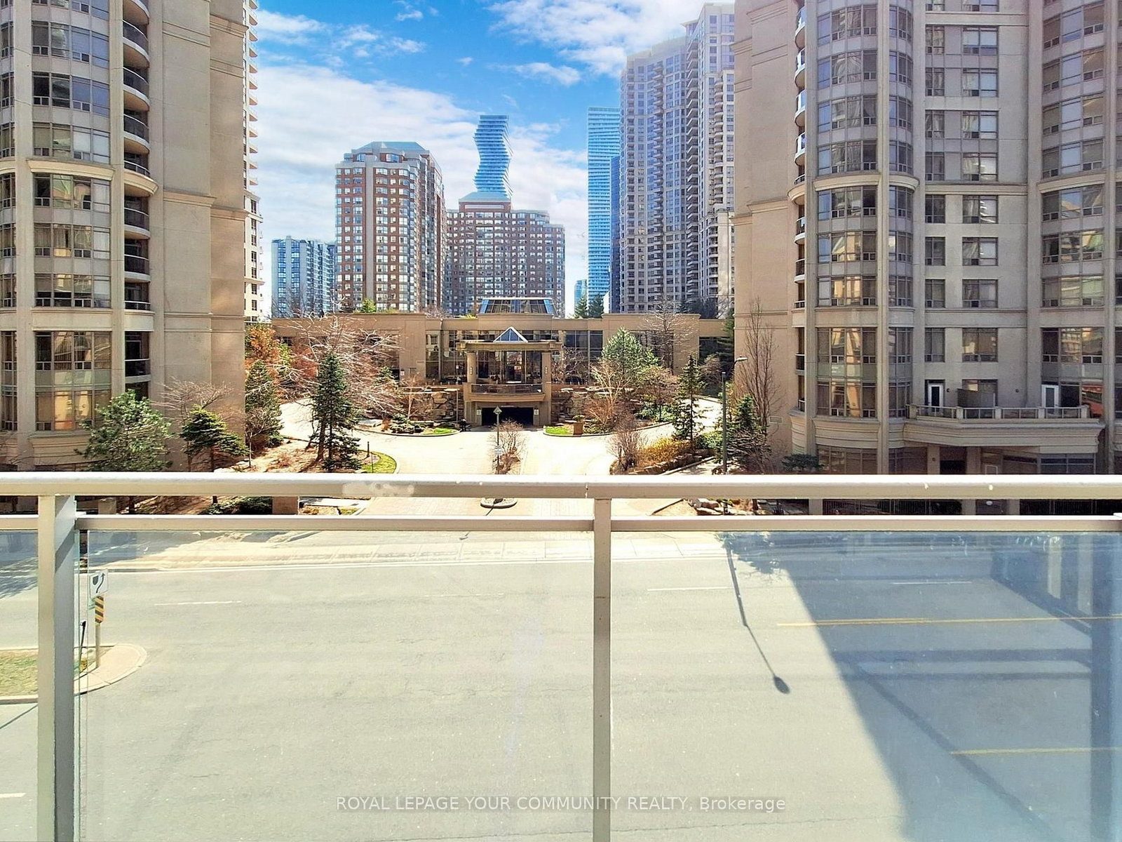 The balcony view overlooking the courtyard entrance and the surrounding City Centre towers