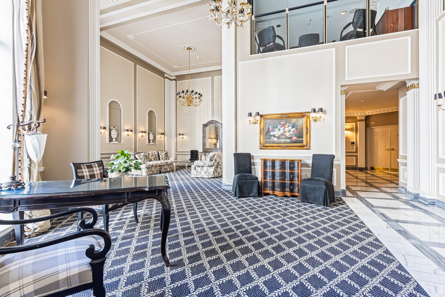 Elegant lobby of Grand Harbour Condominiums with chandeliers