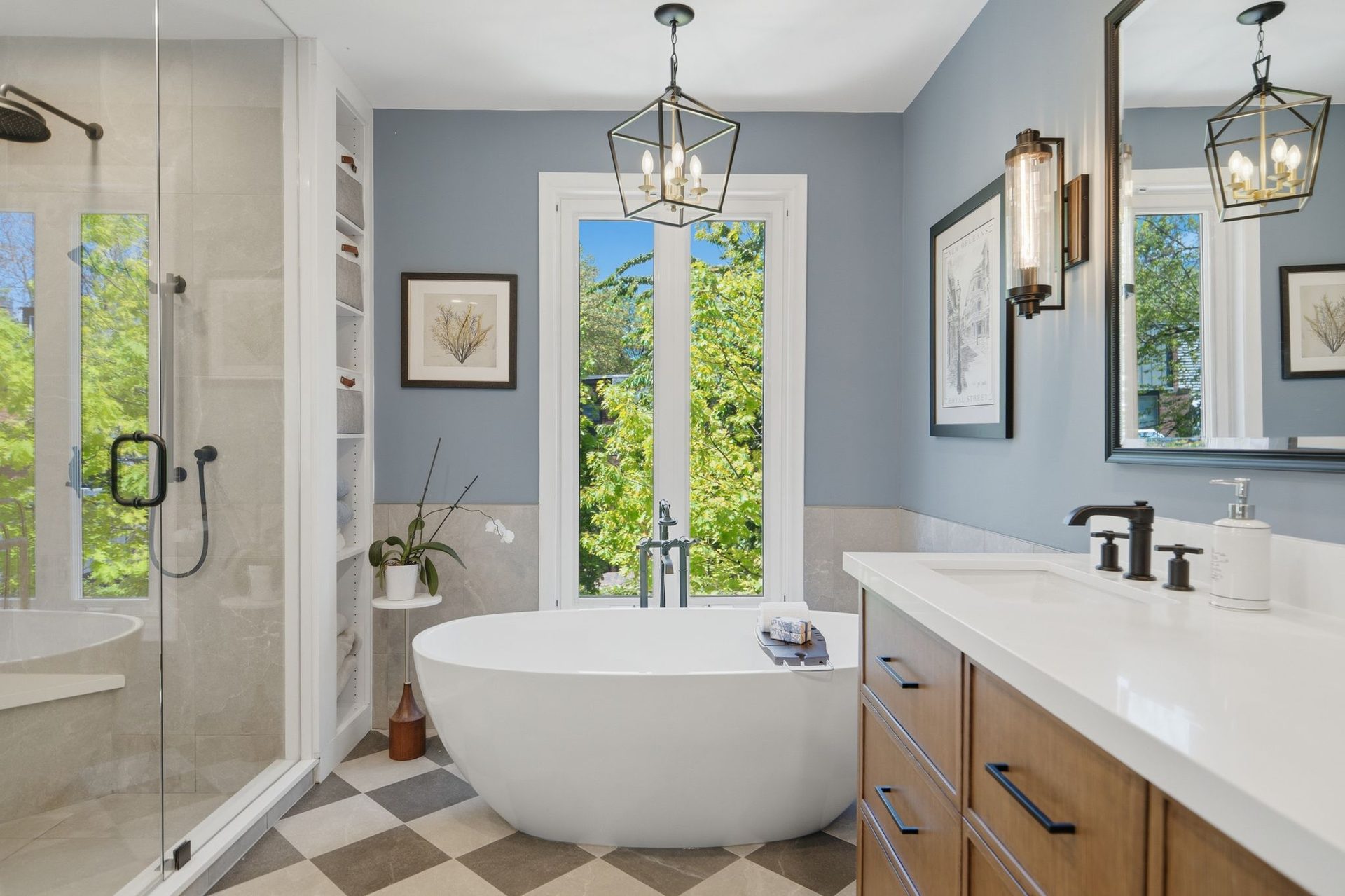 Five-piece ensuite with freestanding soaker tub and checkerboard floor