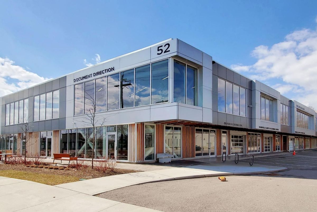 Modern two-storey commercial building at 52 Scarsdale Road, Toronto