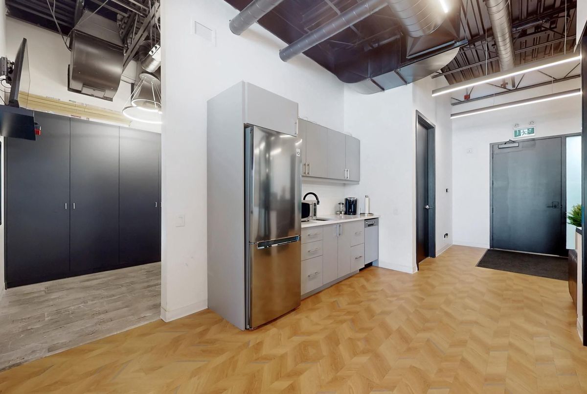 Full kitchenette with stainless steel appliances
