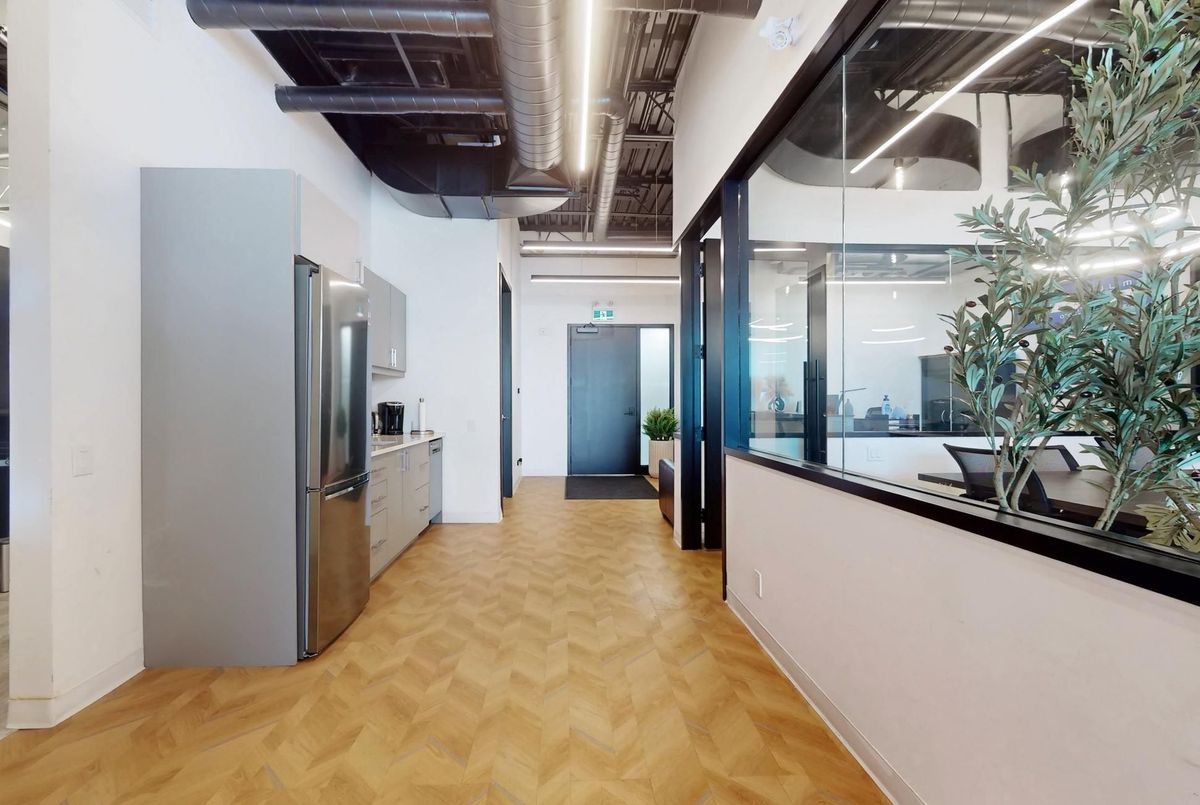 Interior hallway with glass-walled boardroom