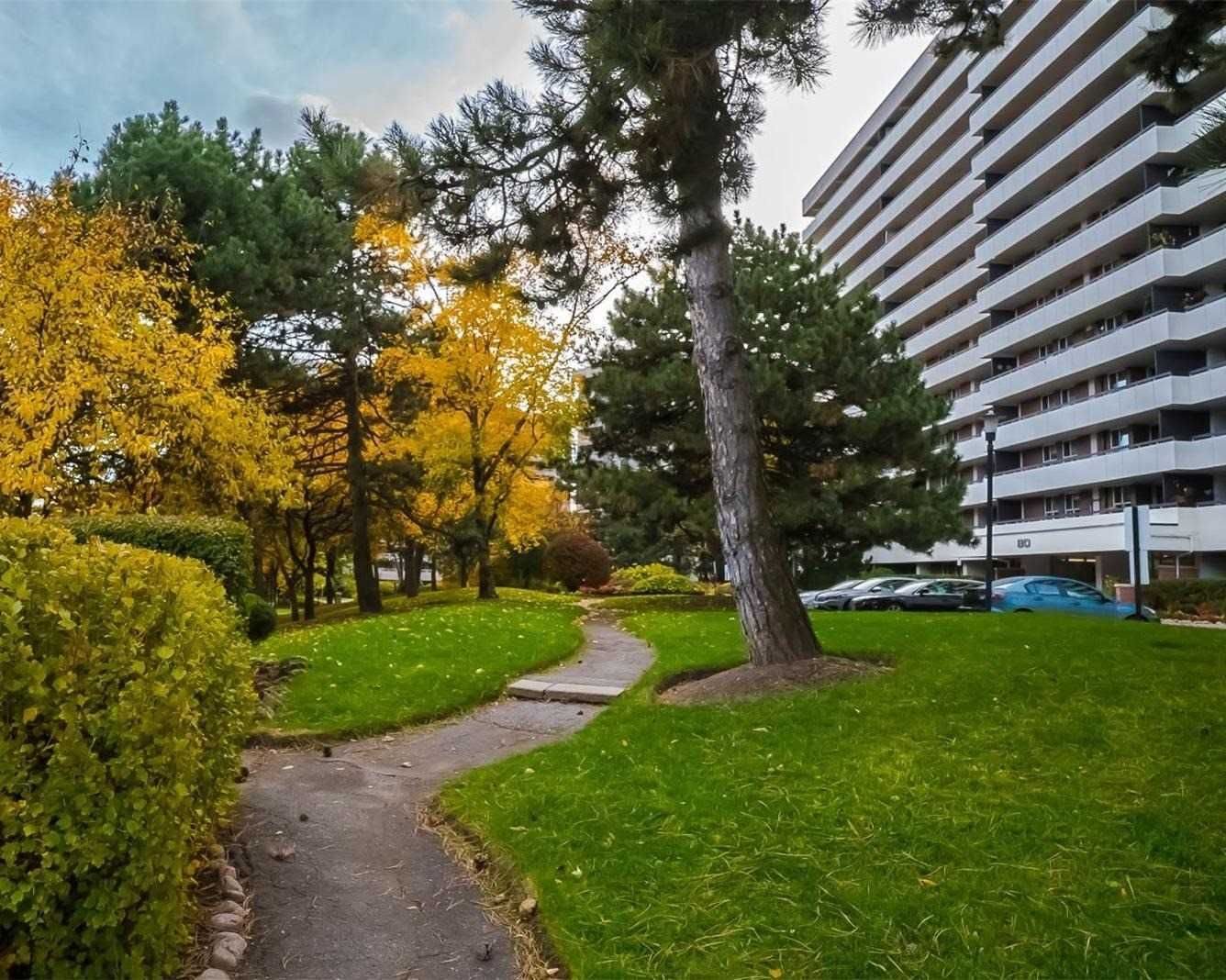 Royal Orchard II building exterior with manicured autumn grounds